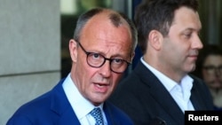 Будущий канцлер ФРГ, лидер ХДС Фридрих Мерц (слева) и лидер коалиционных социал-демократов Ларс Клингбайль