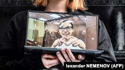 A photograph showing Artyom Kamardin with facial injuries in court earlier this year. 