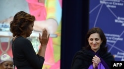 მიშელ ობამა და რუსუდან გოცირიძე