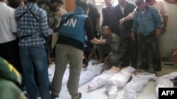 Од 100-тина убиени во Хула, повеќето се жени и деца