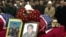 People in Pristina pay their last respects in 2002 to the three Bytyqi brothers who were killed in Serbia in 1999. 