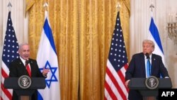 Prim-ministrul israelian, Beniamin Netanyahu (S) și președintele SUA, Donald Trump, în timpul unei conferințe de presă. 