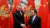 Министър-председателят на Китай Ли Къцян и Мило Джуканович - бивш премиер и настоящ президент на Черна гора, по време на срещата им в Пекин през 2015 г.