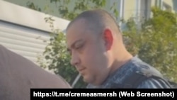 Житель Алушты Игорь Качурец на фрагменте оперативного видео ФСБ, опубликованном в Telegram-канале «Крымский СМЕРШ»