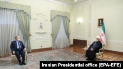 Министерот за надворешни работи на Сирија, Фејсал Мекдад и иранискиот претседател Хасан Рохани