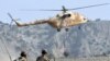 A Pakistani Army helicopter flies as soldiers patrol in Sararogha, South Waziristan (file photo).