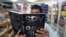 A customer in an Islamabad bookstore looks at Spy Chronicles, a new tell-all tome by former Indian and Pakistani intelligence chiefs that has caused a storm in both countries.