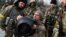 UKRAINE – New members of the Territorial Defence Forces train to operate NLAW anti-tank launcher during military exercises amid Russia's invasion of Ukraine, in Kyiv, March 9, 2022
