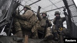 Soldați ucraineni la antrenament, în regiunea Zaporijie (26 ianuarie 2025) 