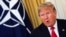 Дональд Трамп на переговорах в НАТО в 2019 году