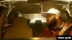 A still from the video report, which spread quickly across Tajik websites. 