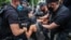 Ukraine -- Police detained several activists near the Belarussian embassy in Kyiv, 10Aug2020