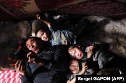 A nomadic family inside a tent in the remote Yamalo-Nenets region of northern Russia (file photo)