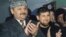 Ахмат и Рамзан Кадыровы в своем родовом селе. Март 2004 года
