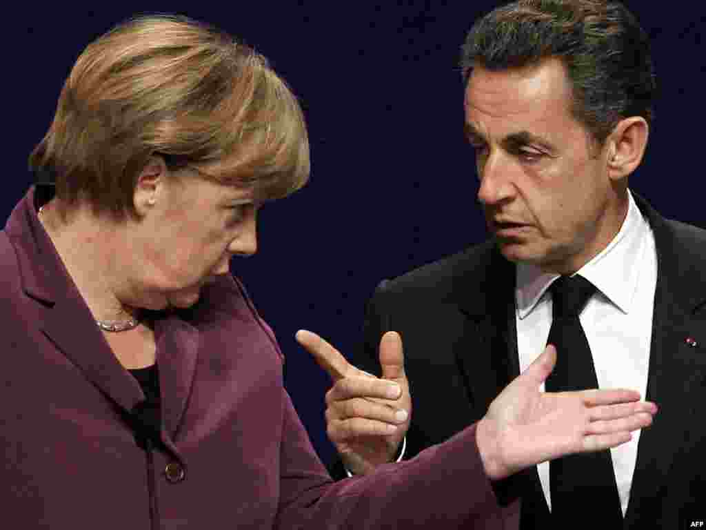 Francuski predsjednik Nicolas Sarkozy i njemačka kancelarka Angela Merkel, Kan, 02.11.2011. Foto: AFP / Thomas Coex 