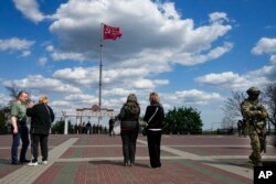 Forțele ruse au ocupat orașul Melitopol pe 1 martie 2022, arborând în oraș un drapel al victoriei sovietice din al Doilea Război Mondial.