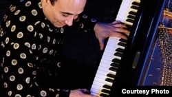 Мишел Камило, пијанист и композитор од Доминиканска Република.