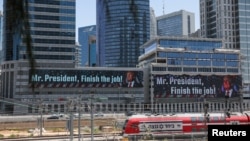 Președintele SUA, Donald Trump, apare pe panouri publicitare uriașe în Tel Aviv