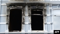 Следи от палежа в жилищната сграда в германския град Солинген, провинция Северен-Рейн Вестфалия, в която загива четиричленното българско семейство.