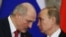 Президент Беларуси Александр Лукашенко и его российский коллега Владимир Путин