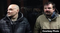 Журналісти Радіо Свобода Дмитро Баркар та Ігор Ісхаков, які були затримані і побиті спецпризначенцями у Києві, 20 січня 2014 року