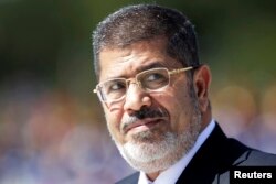 Муҳаммад Мурсӣ.