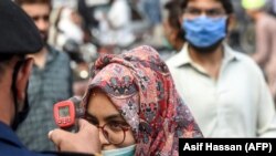 The program, widely touted by Prime Minister Imran Khan, allows authorities to monitor the whereabouts of coronavirus patients and suspected cases -- and to listen in on their phone calls.