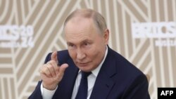 Президентът на Русия Владимир Путин на среща с ръководителите на водещи медии от страните членки на БРИКС, 18 октомври 2024 г. 