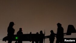 Militari ucraineni din Regimentul 14 de Sisteme Aeriene Fără Pilot se pregătesc pentru lansarea unei drone de atac cu rază lungă de acțiune, vizând teritoriul Federației Ruse, în cadrul operațiunilor de răspuns la invazia rusă asupra Ucrainei.