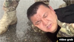 Задержание Артура Идельбаева. Скриншот из репортажа телеканала НТВ