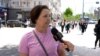 Moldova: a woman speaking at RFE mic in Chisinau