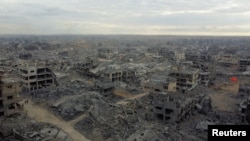 Снимка от дрон показва разрушенията в жилищен квартал на град Газа след изтеглянето на израелските сили от района, 12 октомври 2025 г.