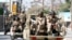 FILE: Pakistani soldiers patrol a street in Quetta, capital of the southwestern Balochistan province.