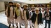 FILE: Mullah Abdul Ghani Baradar, the Taliban group's top political leader, third from left, arrived with other members of the Taliban delegation for talks in Moscow in May 28.