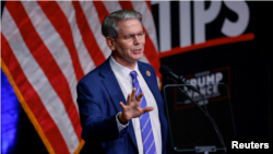 Скот Бесeнт