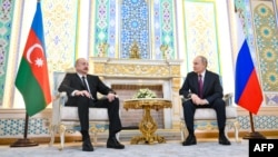 Ильхам Алиев и Владимир Путин в Душанбе, 9 октября