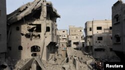 Uništene zgrade u centralnom delu Pojasa Gaze, 7. decembar 2024. U razornom ratu na toj teritoriji od 7. oktobra 2023, prema zdravstvenim vlastima u Pojasu Gaze pod kontrolom Hamasa, ubijeno je više od 44.800 ljudi.