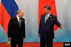 Ресей президенті Владимир Путин мен Қытай басшысы Си Цзиньпин. 1 қыркүйек 2025 жыл.