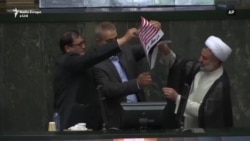 Ligjvënësit iranianë djegin flamurin amerikan