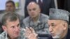 General Stanley McChrystal listens to Afghan President Hamid Karzai in Kabul. Karzai said that the general had cultivated public trust in Afghanistan.
