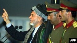 File photo of former Afghan President Hamid Karzai speaking during the Loya Jirga in 2002.