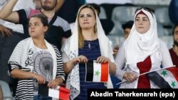 
Tifozet siriane janë lejuar të marrin pjesë në ndeshjen Siri-Iran, që u zhvillua në stadiumin Azadi në Teheran më 5 shtator.