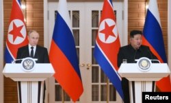 ვლადიმირ პუტინი და კიმ ჩენ ინი. ფხენიანი. 2024 წ. 19 ივნისი