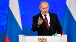 Russian President Vladimir Putin delivers his annual state of the nation address in Moscow on February 20.
