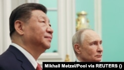 Ruski predsjednik Vladimir Putin (desno) i kineski predsjednik Xi Jinping u Moskvi u maju.
