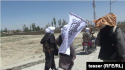 FILE: Taliban fighters in Ghazni during a brief ceasefire in May 2019.