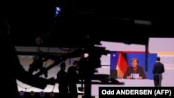 Angela Merkel beszédet mond a párt 33. kongresszusán, amelyet online tartottak Berlinben 2021. január 15-én.