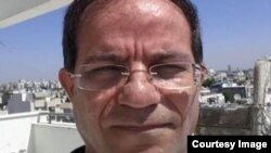 Али Мансури