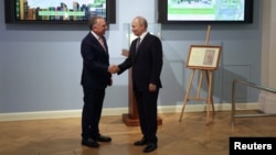 Стивен Уиткофф и Владимир Путин перед началом переговоров в Петербурге, 11 апреля 2025 года