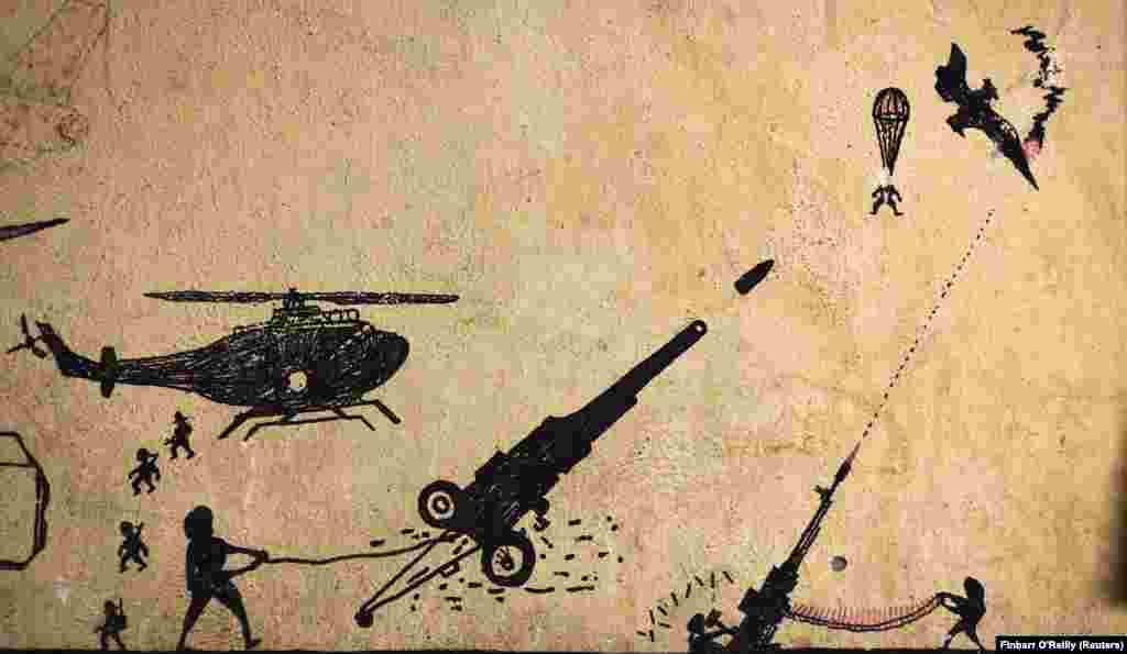 Crteži koje su talibanski borci ostavili na zidu u afganistanskoj provinciji Helmand 2010. godine.